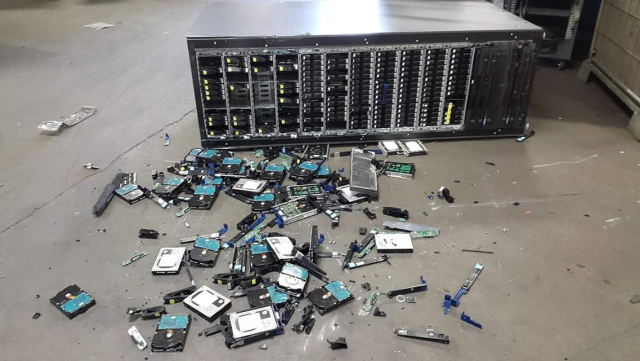 Food of a network storage server that fell down with all the hard drives scattered all on the floor.