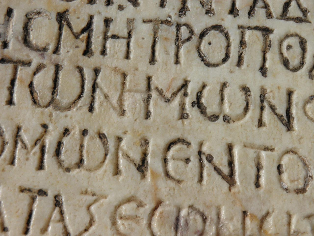 Image of unreadable ancient letters. 