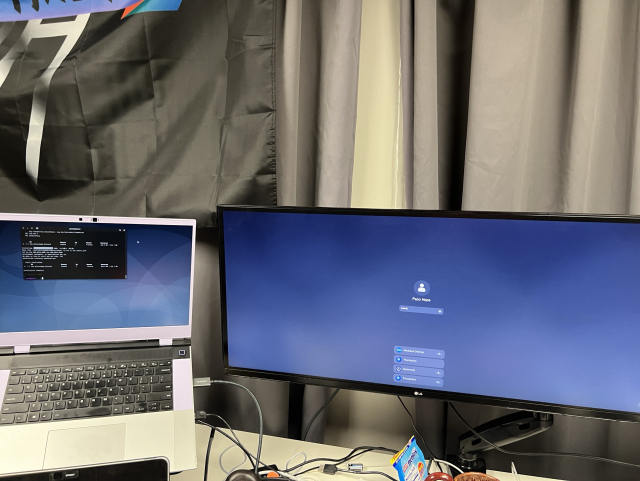 Photo of a laptop connected to an external monitor. 
