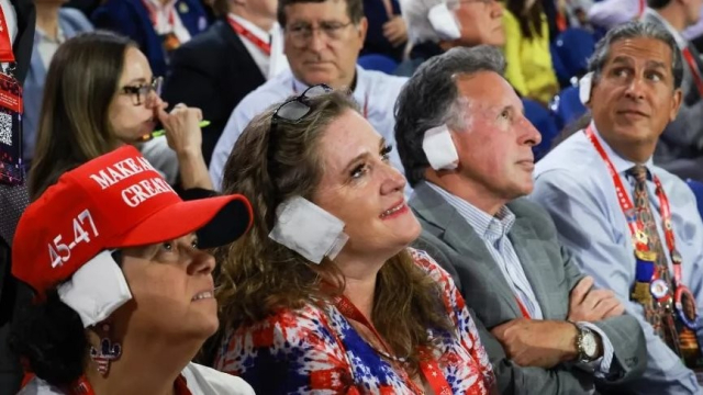 GOP convention attendees wearing ear bandages like Trump.