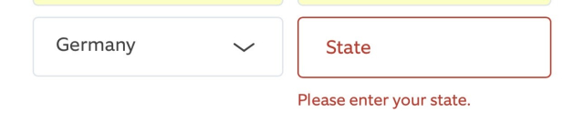 A screenshot of a web form, with two fields: a dropdown field on the left, with “Germany” selected and a text field on the right, asking for a state. The text field is empty and has a red highlight and an error message “Please enter your state”.