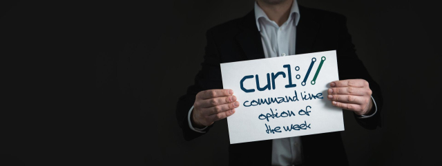 A sign saying "curl command line option of the week"