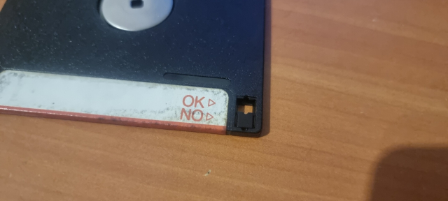 A floppy write protection switch that says Ok and no under it