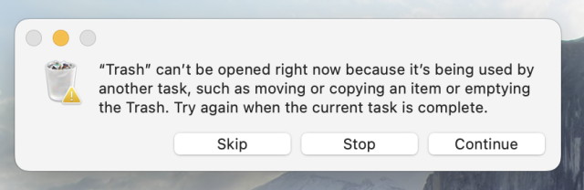 A macOS dialog saying ‘“Trash” can’t be opened right now because it’s being used by another task, such as moving or copying an item or emptying the Trash. Try again when the current task is complete.’