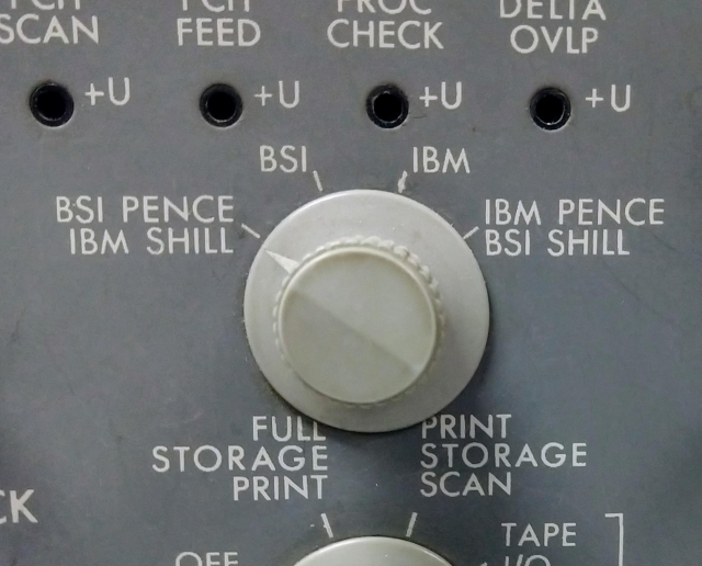 A knob with four settings for pence and shillings using BSI or IBM standards.