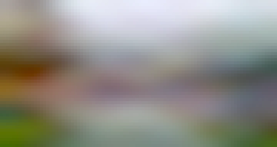 colorful flags on a cliffside