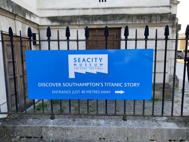 A sign of the Seacity Museum, saying “Discover Southampton’s Titanic Story.”