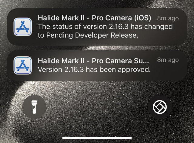 An iPhone Lock Screen with notifications saying our update was approved.