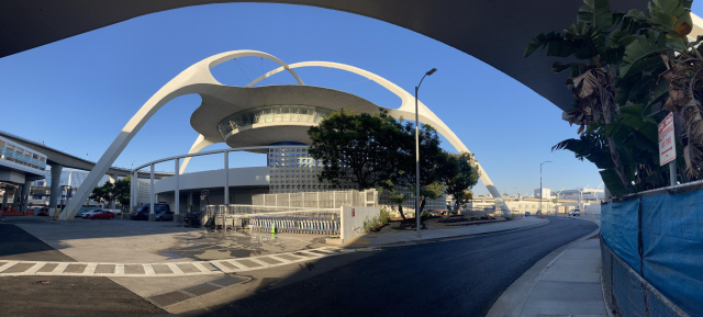 horizontal pano shot of the ufo/saucer shaped Theme Building at LAX