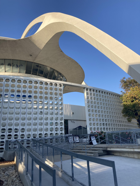 vertical shot of the ufo/saucer shaped Theme Building at LAX