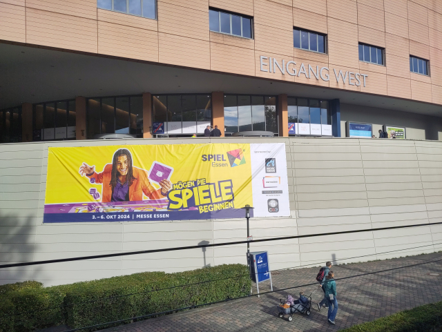 Photo of the Messe Essen entrace with a banner advertising the SPIEL board game exhibition.