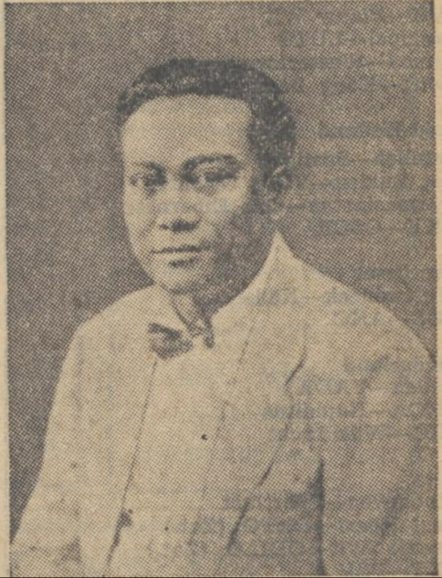 black and white grainy newspaper photo, portrait of a 1940s Indonesian man with a bowtie and suit and slicked-back hair (the communist leader Musso)