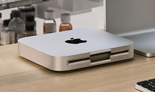 A photo of the old style Mac mini with its wide 5.25 inch floppy drive.