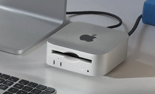 A photo of the new M4 Mac mini with its modern 3.5 inch floppy drive.