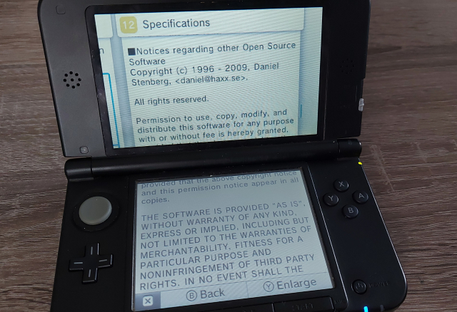 Nintendo 3DS XL on a wodden table showing the specifications screen of the internet browser.

"[...] Notices regarding other Open Source Software
Copyright (c) 1996 - 2009, Daniel Stenberg, <daniel@haxx.se>. [...]"