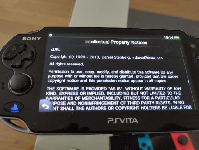 A picture of a PS Vita displaying the Curl licence