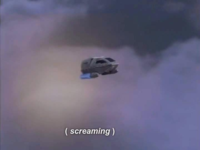 Zoomed out we see a small, lone shuttlecraft flying through a cloudy sky. Closed caption reads, "(screaming)"