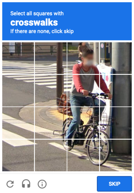 A select-all-squares-with captcha featuring a cyclist and two pedestrian crosswalks.