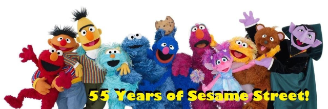 Photo of a group of Sesame Street Muppets including Elmo, Ernie, Bert, Rosita, Cookie Monster, Grover, Telly Monster, Abby Cadabby, Zoe Baby Bear and The Count with "55 Years of Sesame Street" written below them