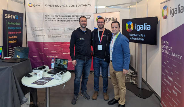 Andrés Gómez, Christian Gmeiner and Samuel Iglesias in the Igalia booth at Electronica Fair 2024