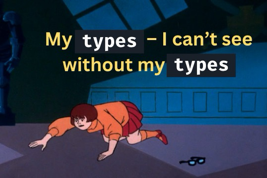 A photo of Velma from Scooby Doo looking for her glasses with the text "my types - I can't see without my types"