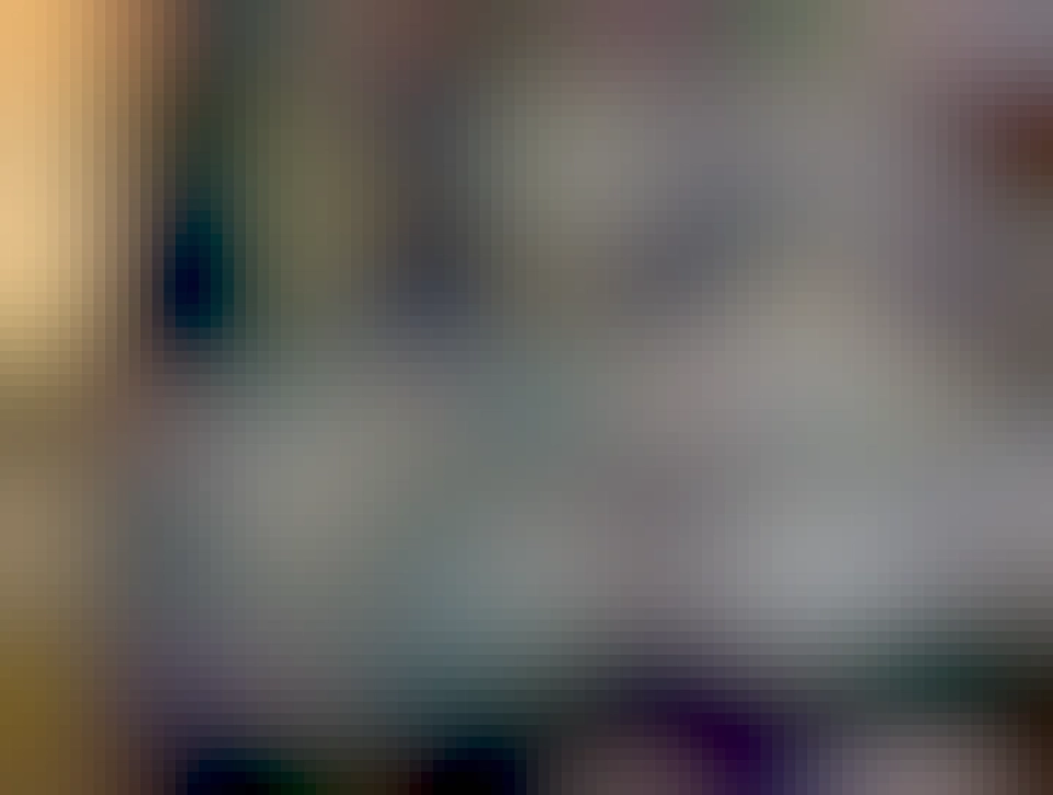 Laser engraved slate coasters showing markings of a 8085, a Z80 and a 6502