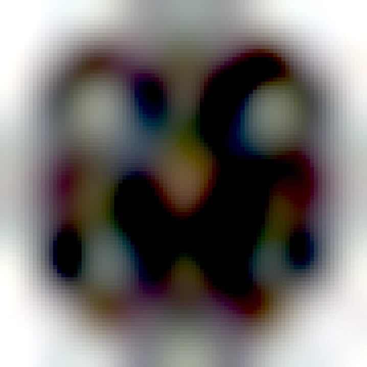 Braun analog alarm clock showing 10:10