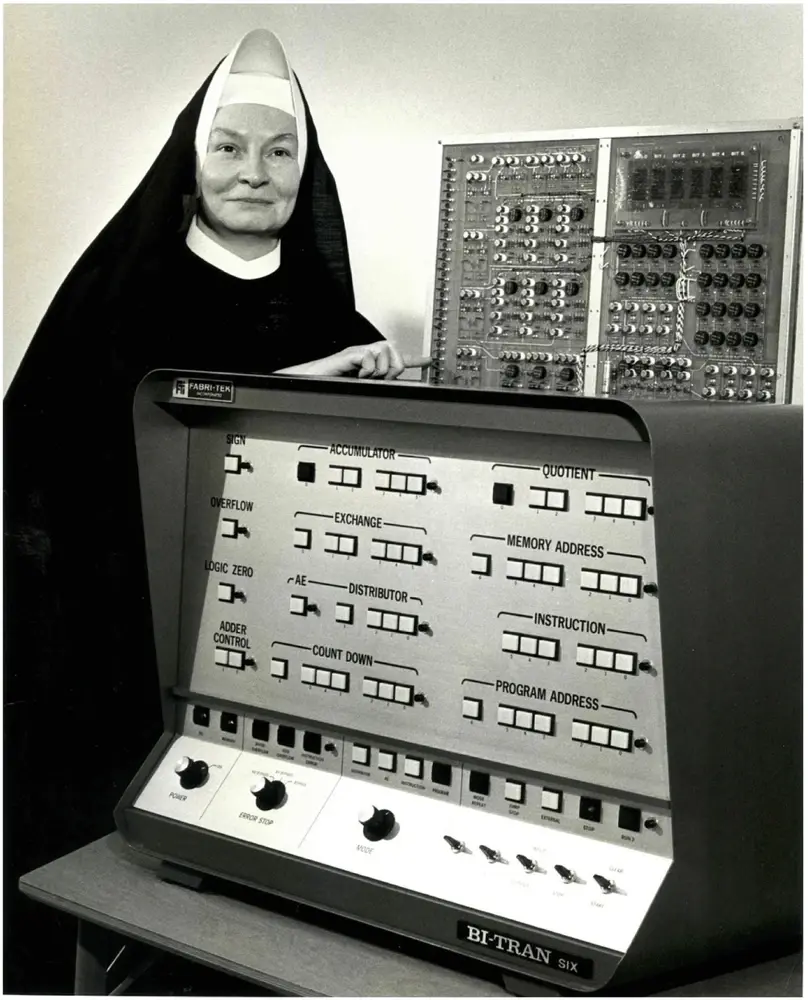 Sister Kenneth with Bi-Tran Six computer.
Photo credit: Clarke University Archives.