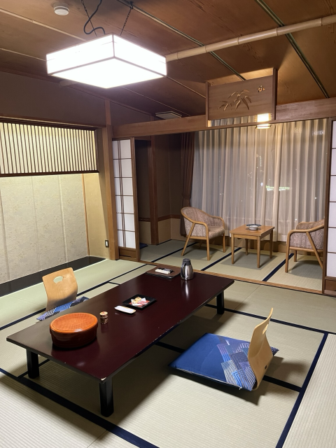 Traditional Japanese tatami room with low table and chairs