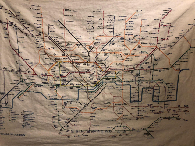 This is genuinely a picture of the London Underground map in cross-stitch, complete with the key to lines and interchanges