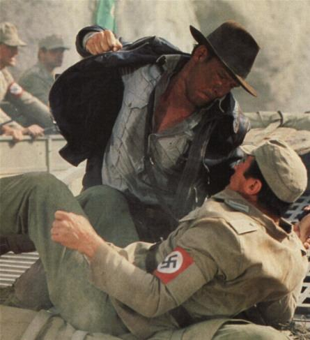 Indiana Jones is punching a nazi in the face