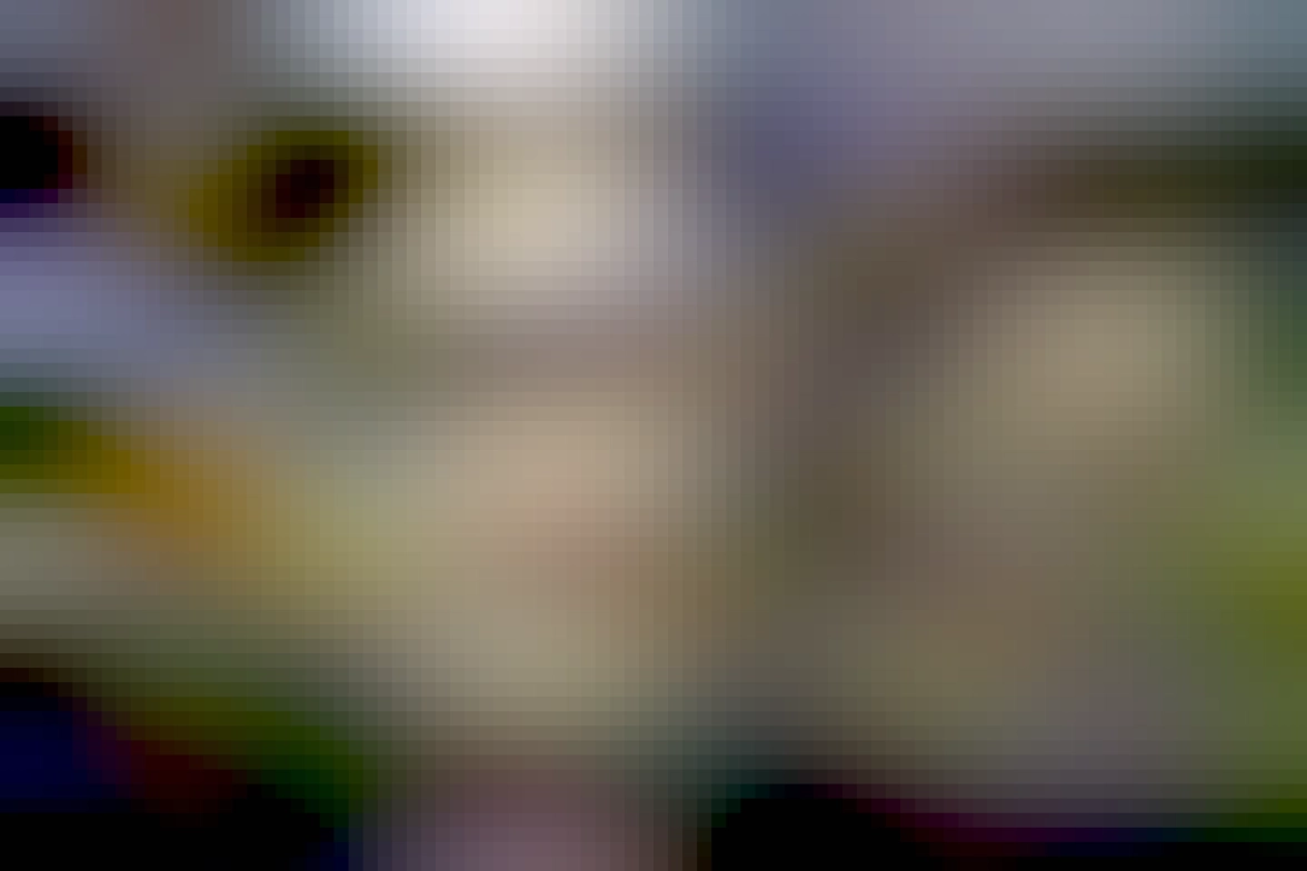 in front of building 40 with glass facade