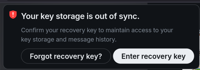 A message about key storage being out of sync

Two choices

"Forgot recovery key?"
or 
"Enter recovery key".

There is no close box.