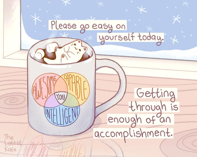 A drawing of a marshmallow cat floating in a mug of cocoa. The caption reads, "Please go easy on yourself today. Getting through is enough of an accomplishment."