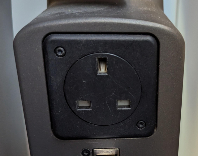 A BS 1363 socket in a train seat.