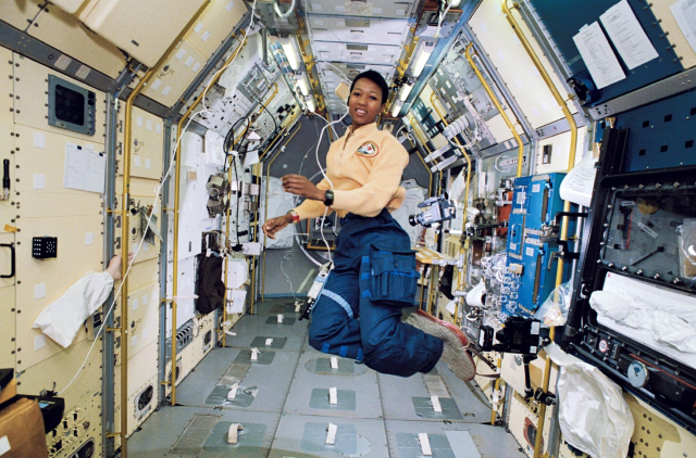 Dr. Mae Jemison floating in the main cabin of the space shuttle