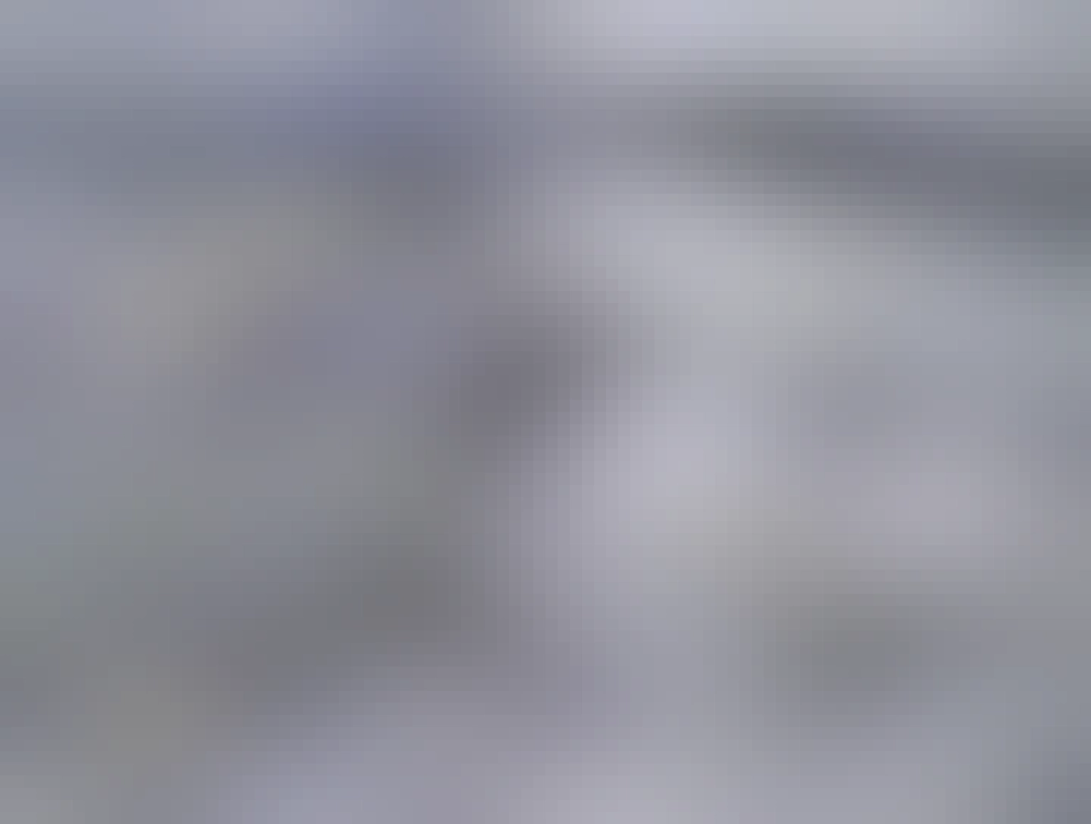 Look! Spring is just around the corner!

Photo of a large metal spring peeking around the corner of a building 