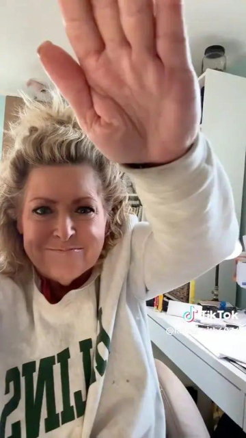 Laura Smith, Nazi, doing a Nazi salute on TikTok, 2025. 