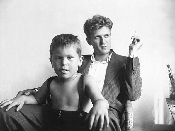 Baby Robert de Niro with his dad, looking confidently at the camera. Even as a kid, his swag is undeniable.