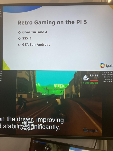 A screen showing a slide in the upper half:

Retro Gaming on the Pi 5
- Gran Turismo 4
- SSX 3
- GTA San Andreas

On the bottom half, a video of GTA San Andreas playing on the Raspberry Pi.