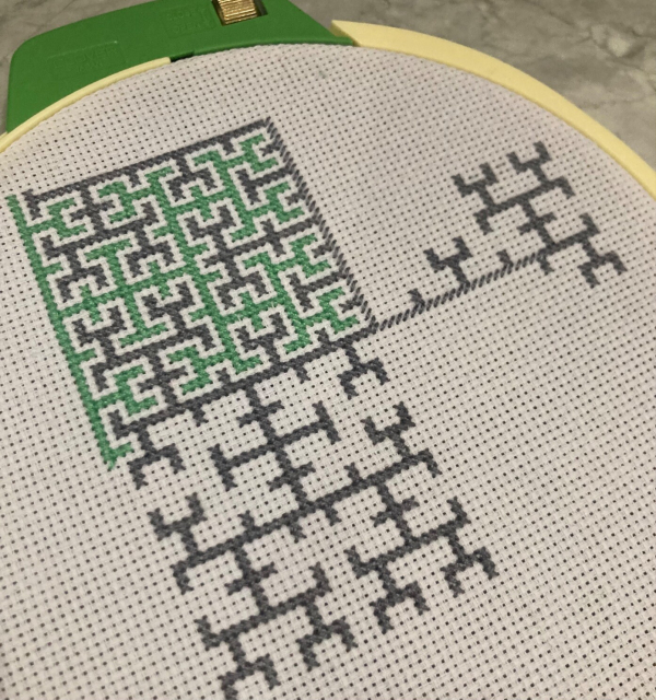 More cross-stitch of the negative space around a fifth-iteration Hilbert curve