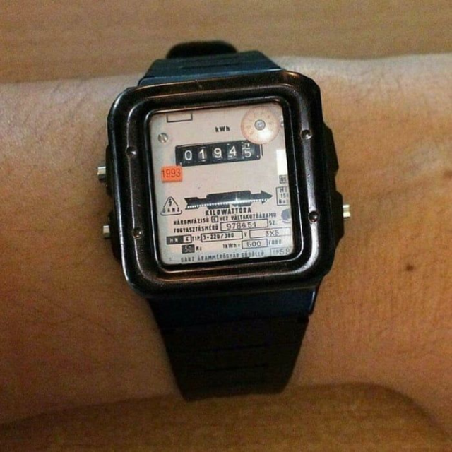 it's a square digital wristwatch with the face being an electricity meter
