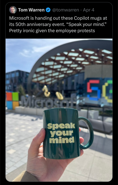 Photo of a mug handed out by Microsoft with the words "Speak your mind" printed on them.