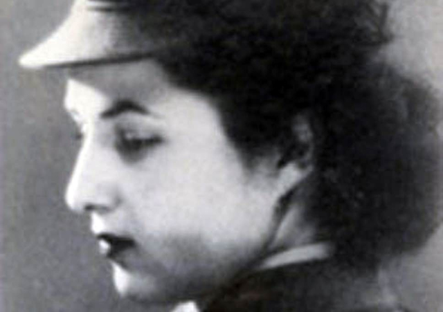 poor quality snapshot of Odette Wilen in her uniform. She is a white woman with dark hair.