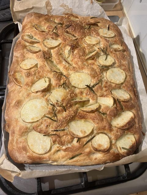Sheet pan focaccia, with potato slices, rosemary, and grated cheese