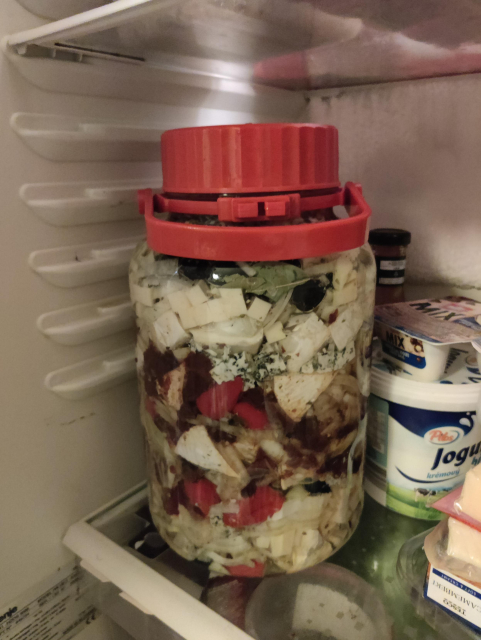 Pickled cheese in a huge jar