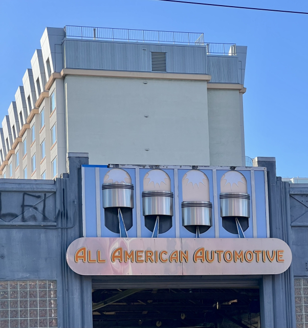 ALL AMERICAN AUTOMOTIVE

Very art deco, the sign incorporates four pistons
