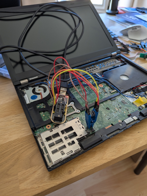 ch341a eeprom programmer hooked up to a bunch of jumper wires going to a crocodile clip attached to the bios chip of Thinkpad x230