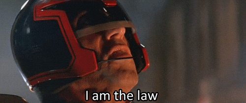 Judge Dredd yelling I AM THE LAW
