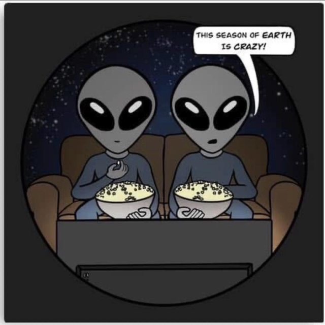 Comic of two aliens watching tv and eating popcorn. One of them says "This season of Earth is crazy!"